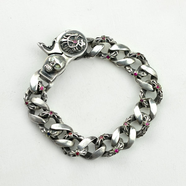 Silver and rubies bracelet handmade by Mexican artisans with the lost wax technique.