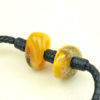 Baltic amber bracelet made of English pelibuey leather, highly appreciated for its hardness and resistance. Traced by hand by Mexican artisans. NO GLUE, no uncomfortable knots, authentic craftsmanship and technique inspired by Mão Gaúcha.